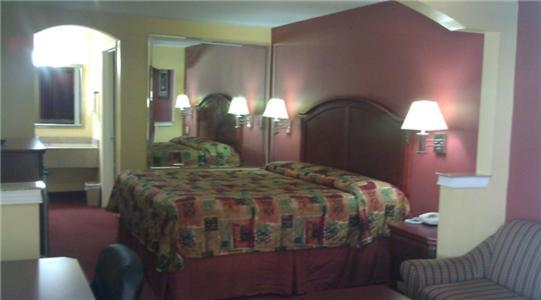 Scottish Inns Suites East Sam Houston Pkwy North Ченълвю Стая снимка